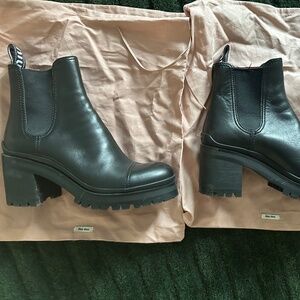 Mui Mui black leather boots